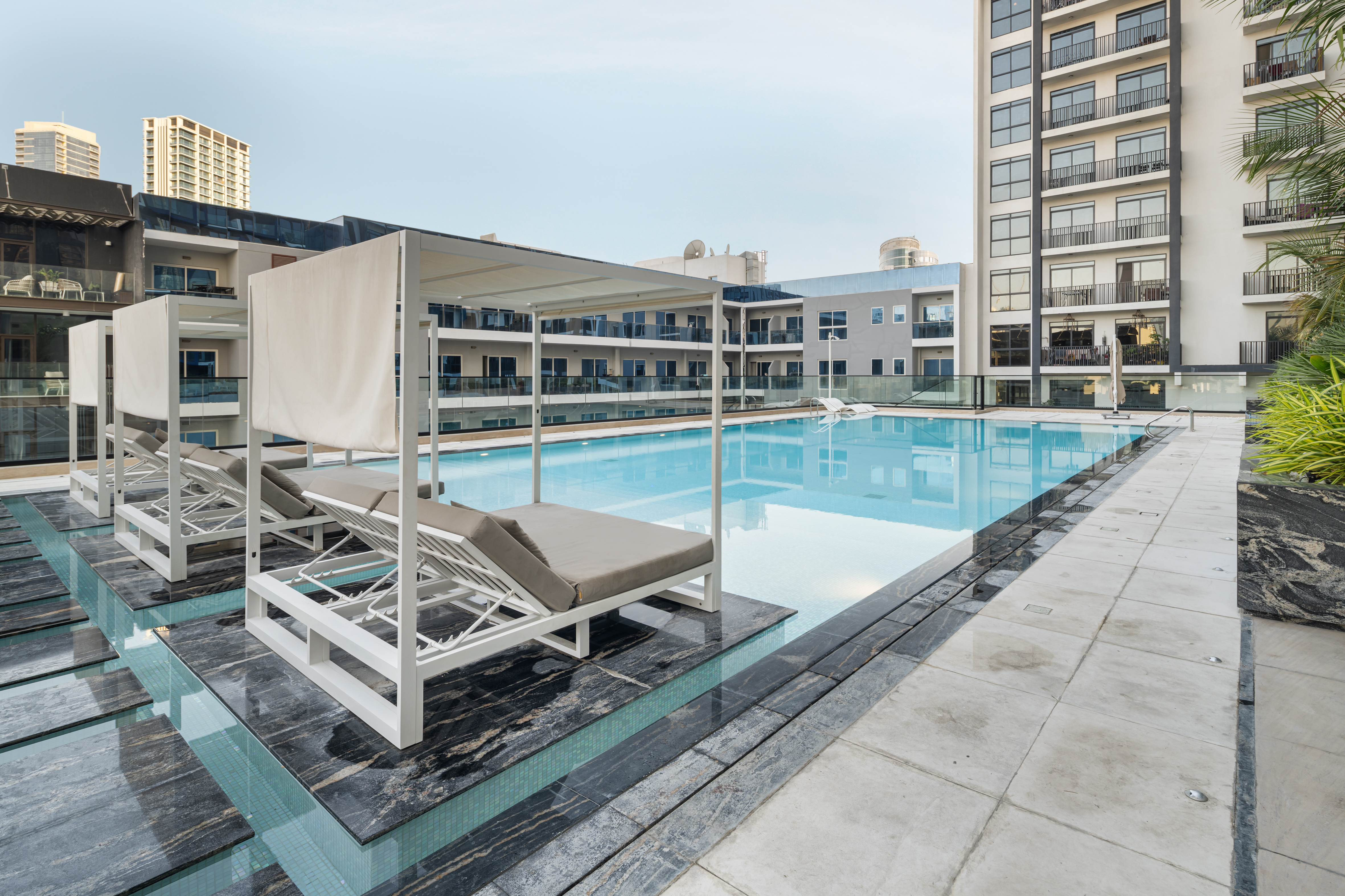 Luxury 1BR JVC | Pool & Balcony by Circle Mall – photo 3